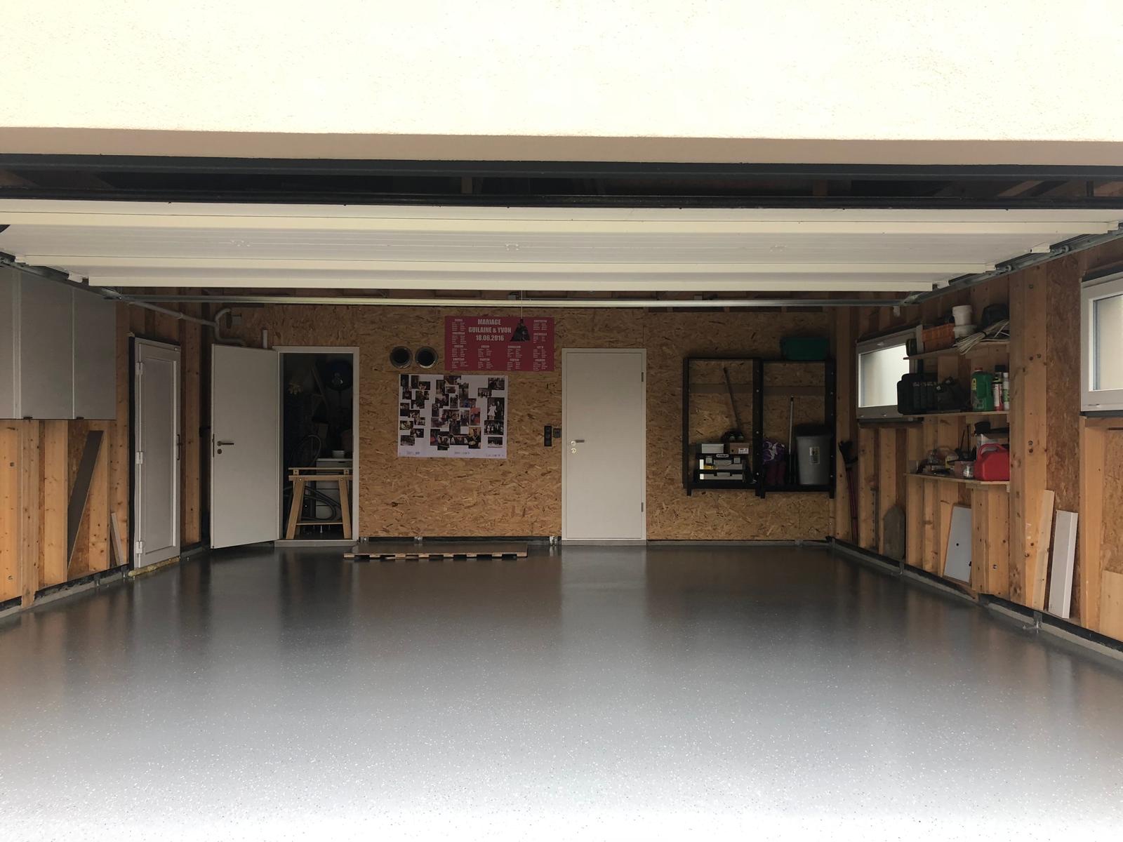 Garage particulier — résine grise — après réalisation Haussmann Sols Résine