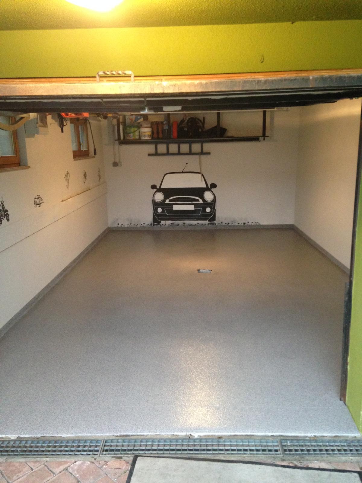 Garage double — résine béton allégée — après réalisation Haussmann Sols Résine