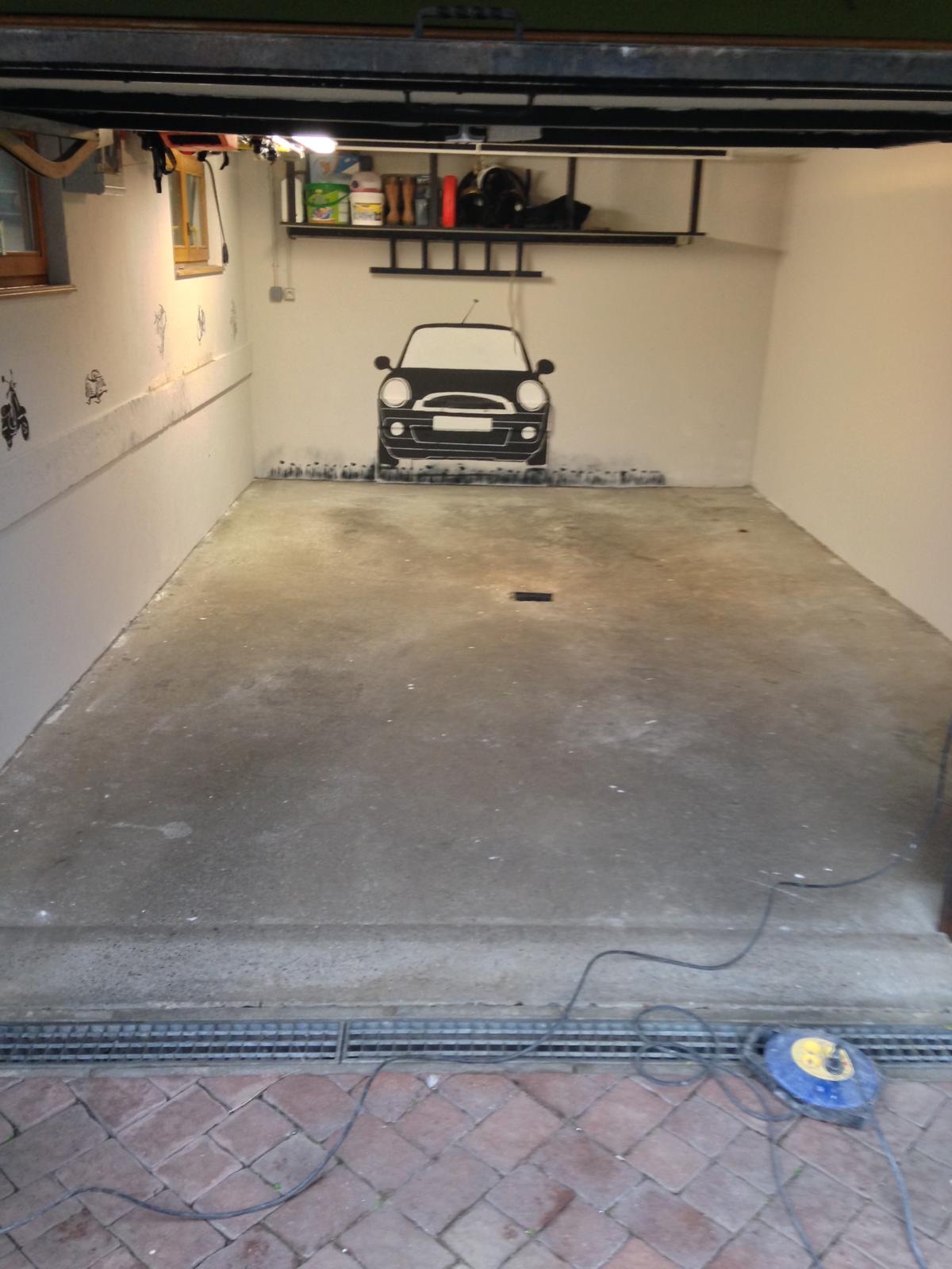 Garage double — résine béton allégée — avant travaux